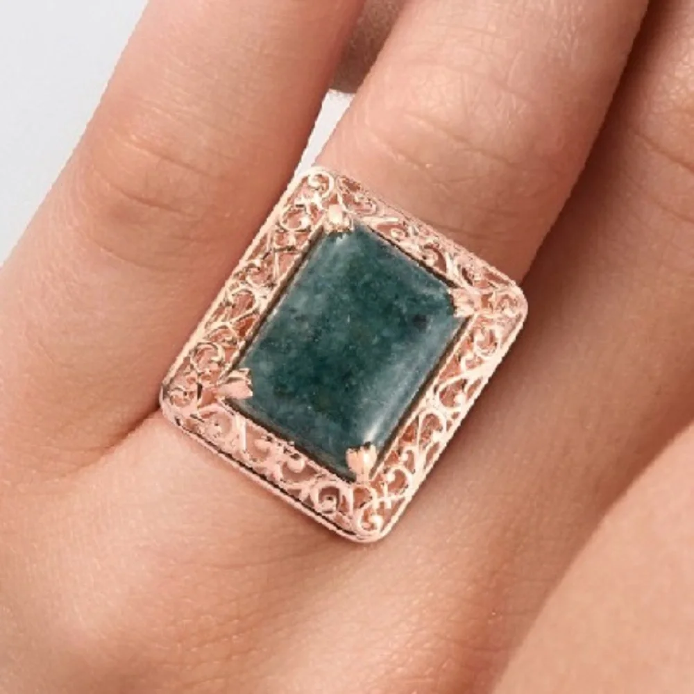 Constituted Malagasy Neon Apatite Solitaire Ring